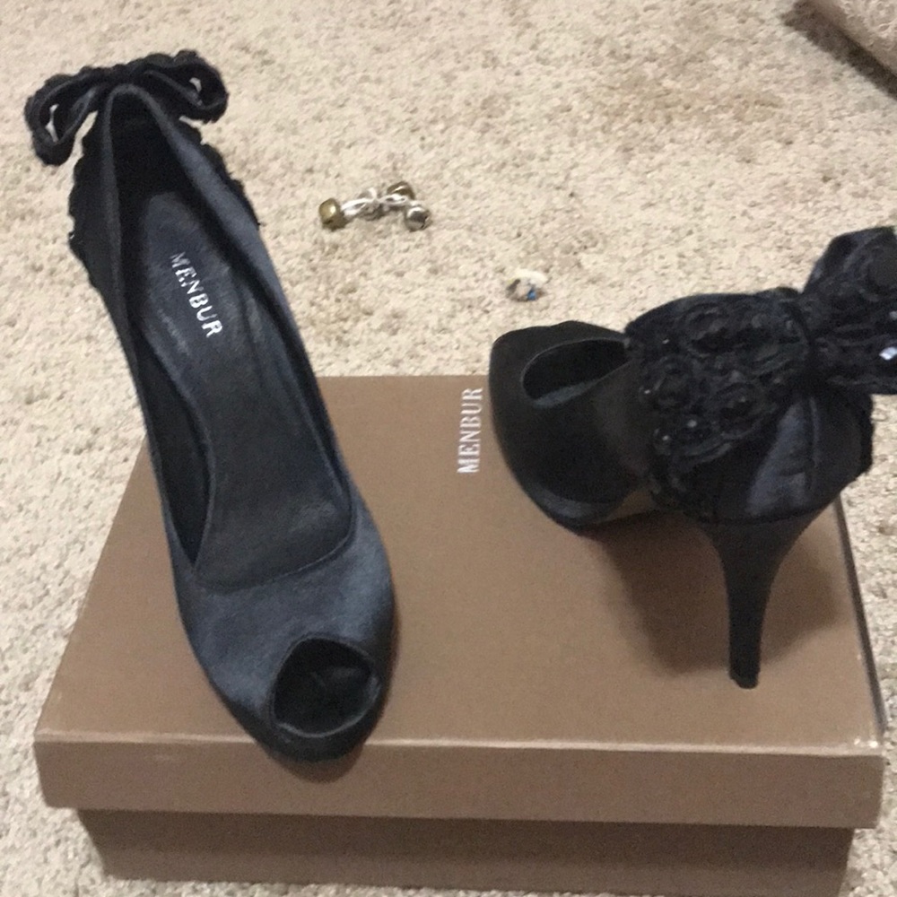 Black Peeptoe pump with studded bow on the heel